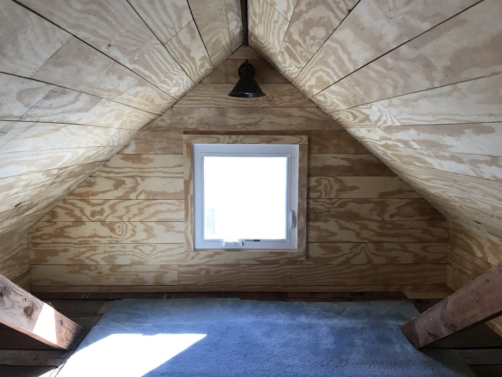 Faux shiplap with plywood. Attic play room. 