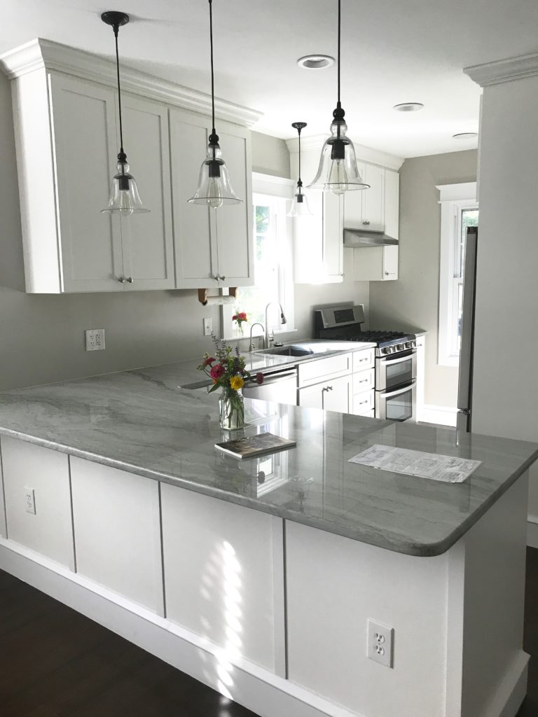 white kitchen with sea pearl quartz counters