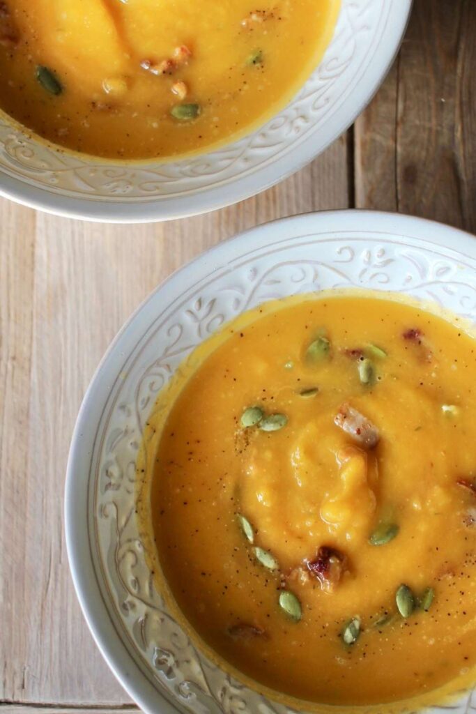 Up close photo of this deliciously easy butternut squash soup recipe made from scratch in under 30 minutes.