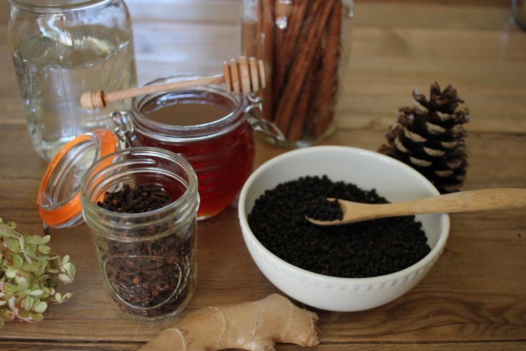 ingredients for making homemade elderberry syrup 